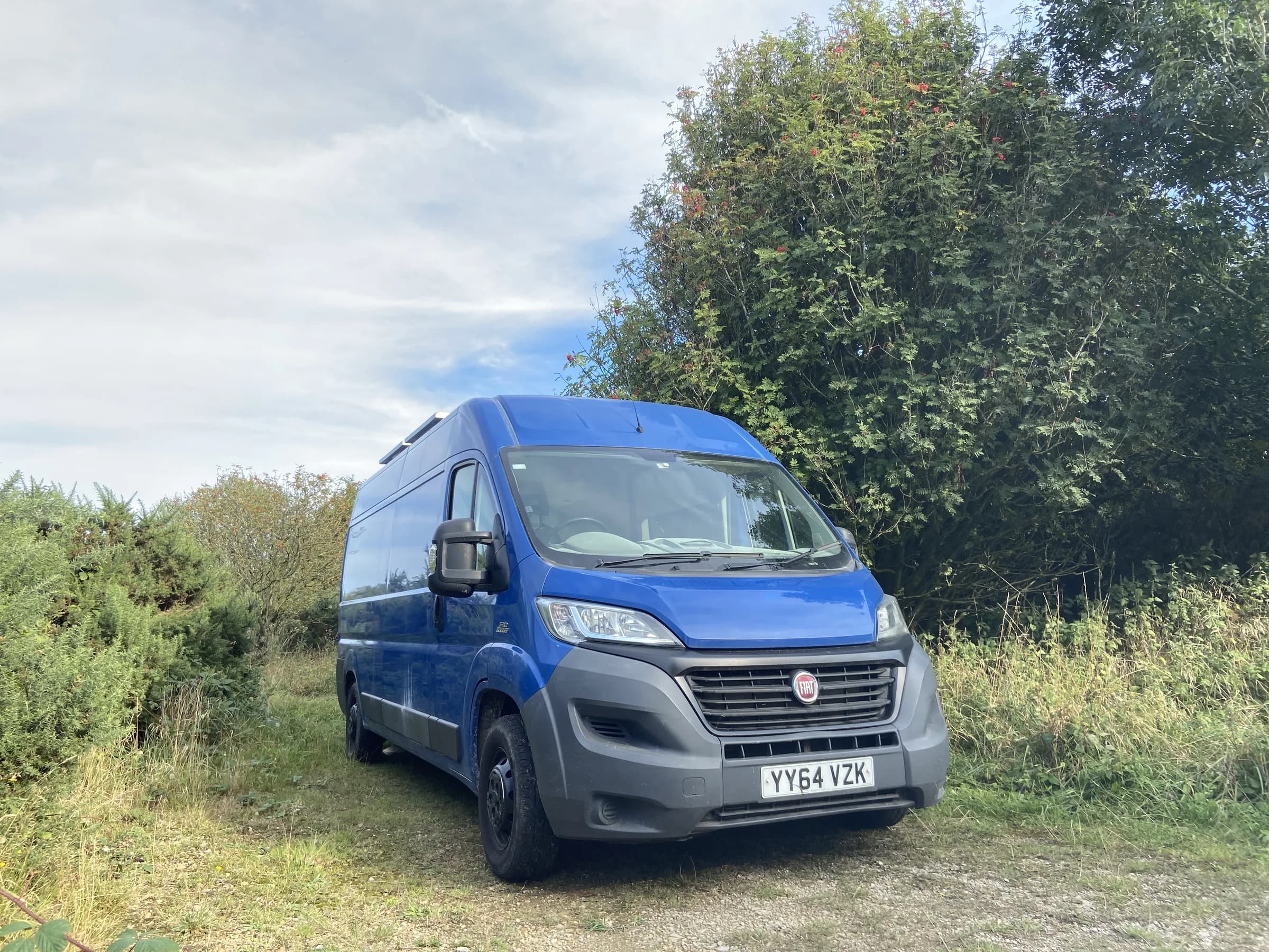 Blue Fiat Ducato high-roof campervan used for the Roam Wired conversion
