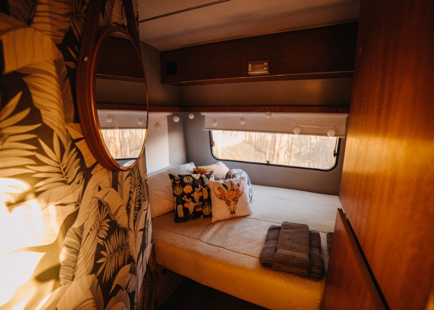 Warm sleeping area inside a campervan prepared for cold weather