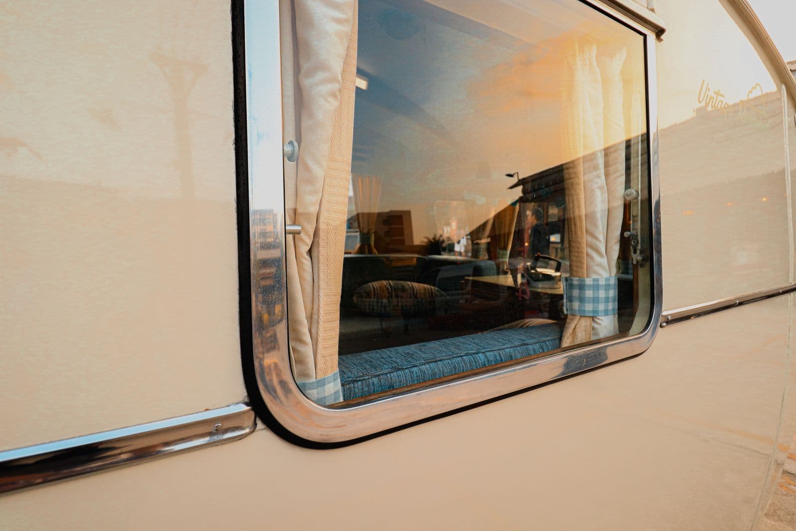 Campervan interior arranged for laptop work and travel