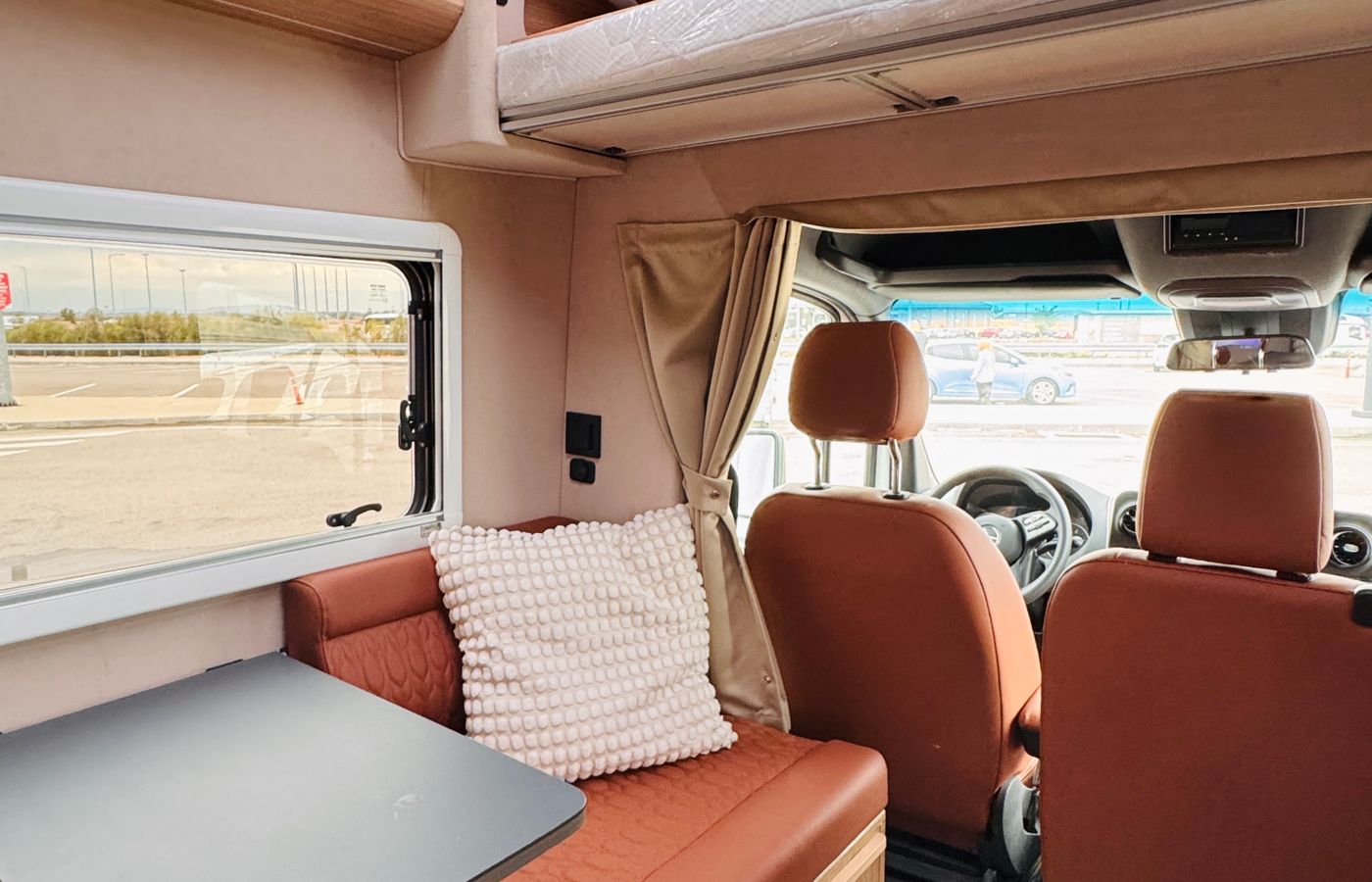 The cosy interior of a modern campervan