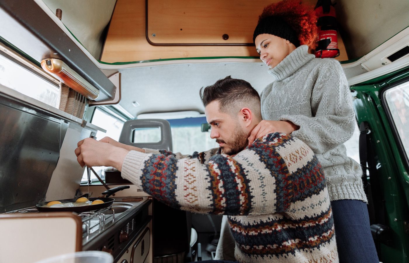 Cooking in a campervan kitchen