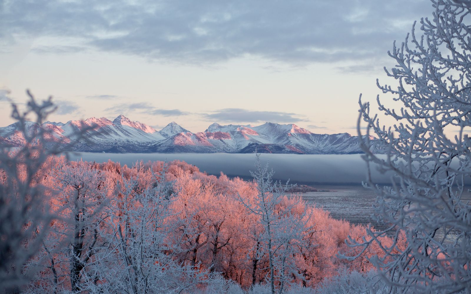 Snowy mountains at sunrise near Anchorage, Alaska