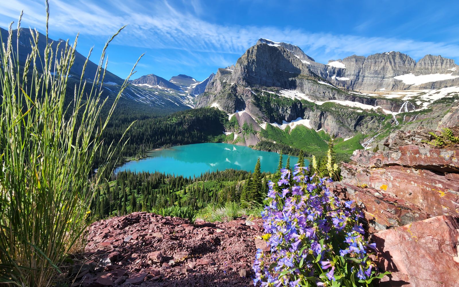 Emerald Lake ringed by mountains in Glacier National Park, Montana