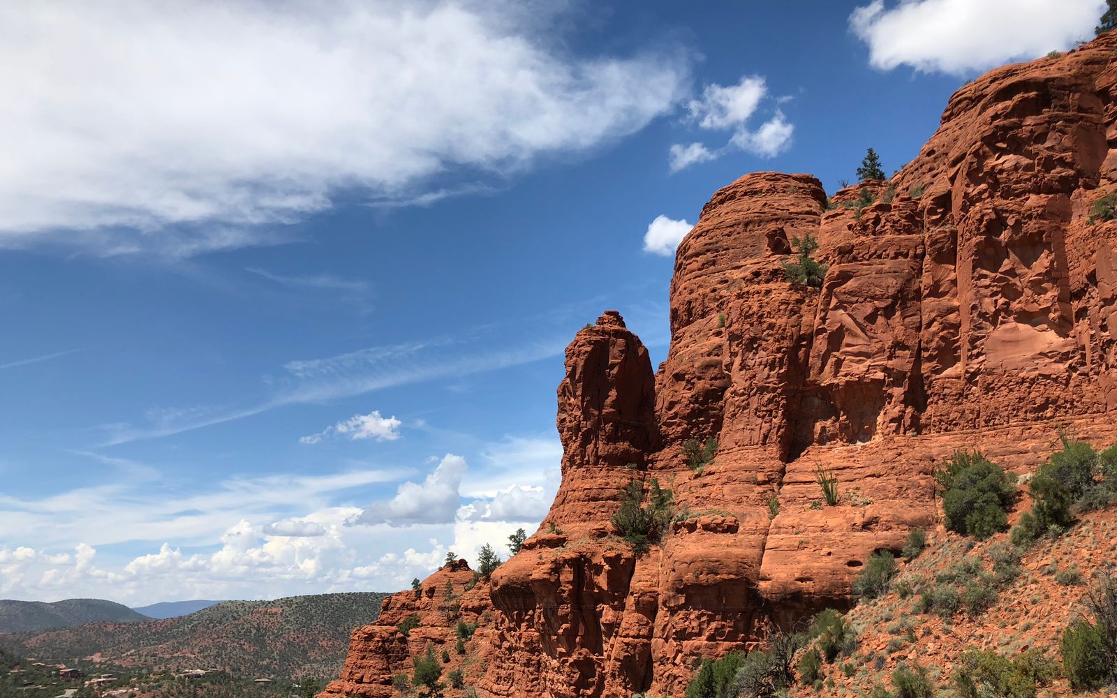 Red-rock formations under blue sky in Sedona, Arizona